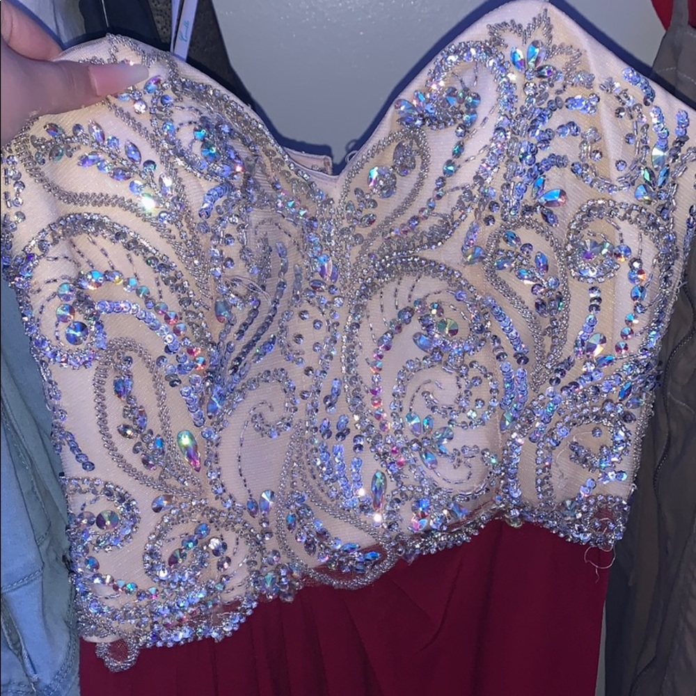 Burgundy prom dress with open leg cut
